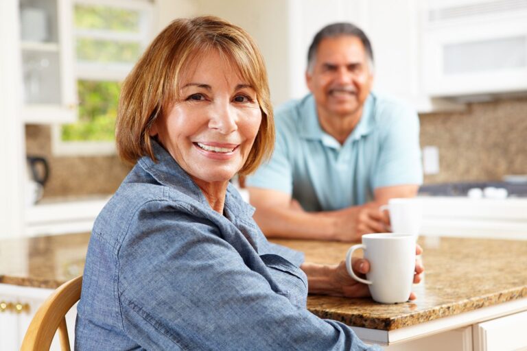 Senior couple relaxing in kitchen